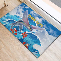 Personalized blue sea fish doormat with custom text and red flowers, angled view