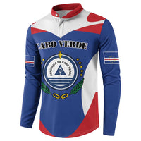 Blue quarter-zip sweatshirt with red collar, Cabo Verde crest graphic and flag color panels