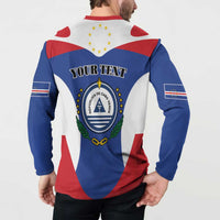 Blue quarter-zip sweatshirt with red collar, back crest with “YOUR TEXT” and flag panels