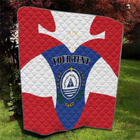Quilted blanket close-up showing Cape Verde flag print with custom text and crest