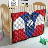 Quilted blanket on crib bedding with Cape Verde flag print and custom text crest
