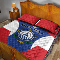 Quilt bed set with Cape Verde emblem centered on red, white, and blue quilted comforter