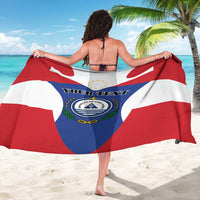 Cape Verde flag sarong worn as a wrap, showing coat of arms center panel