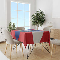 Cape Verde flag-style tablecloth with coat of arms on dining table and chairs