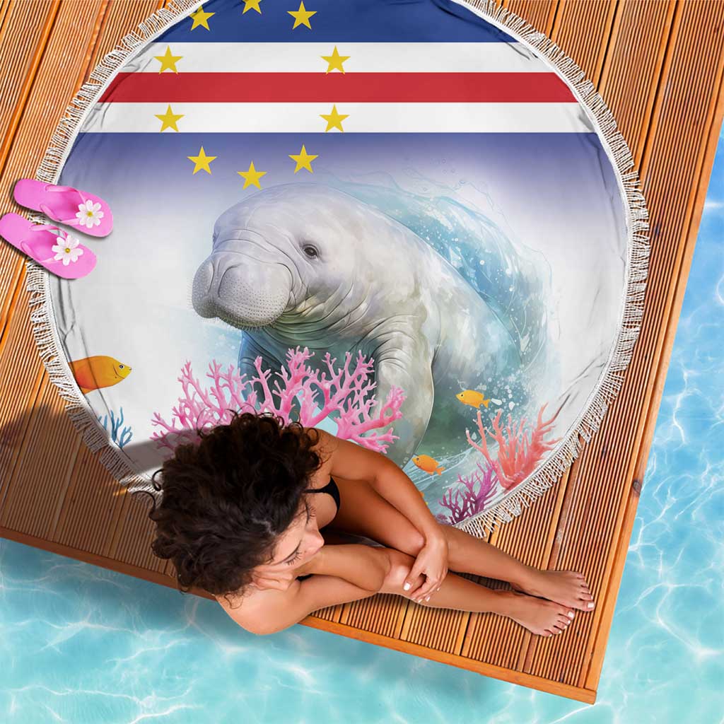 Blue round beach blanket with fringe, manatee and coral reef flag stripes