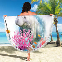 Blue round beach blanket with fringe, manatee and coral reef flag design