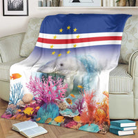 Coral reef manatee blanket with Cape Verde flag style, draped on an armchair