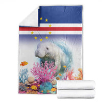 Coral reef manatee blanket with Cape Verde flag style, shown with folded white stacks