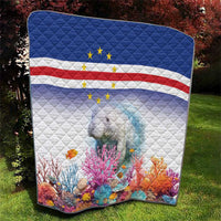 Corner view quilt with Cape Verde flag stripes, yellow stars, and manatee by coral