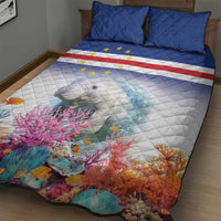Manatee and coral reef quilt bed set with blue pillows and flag stripe band, full bed view