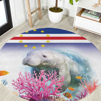 Round manatee and coral reef rug with blue, red stripe and yellow star flag pattern