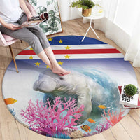 Round manatee reef rug with pink coral, fish, and blue-red stripe yellow star flag pattern