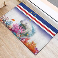 Blue rubber doormat corner view with Cape Verde flag and manatee coral reef scene