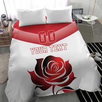 White duvet cover and pillowcases featuring red rose, 'YOUR TEXT', and '00' logo