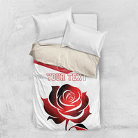 White duvet cover and pillowcases with red rose graphic, 'YOUR TEXT' text