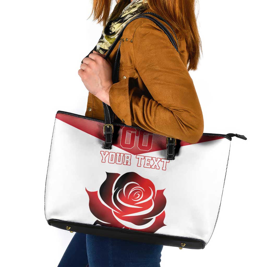 Red rose graphic leather tote bag, white with red stripe and black handles