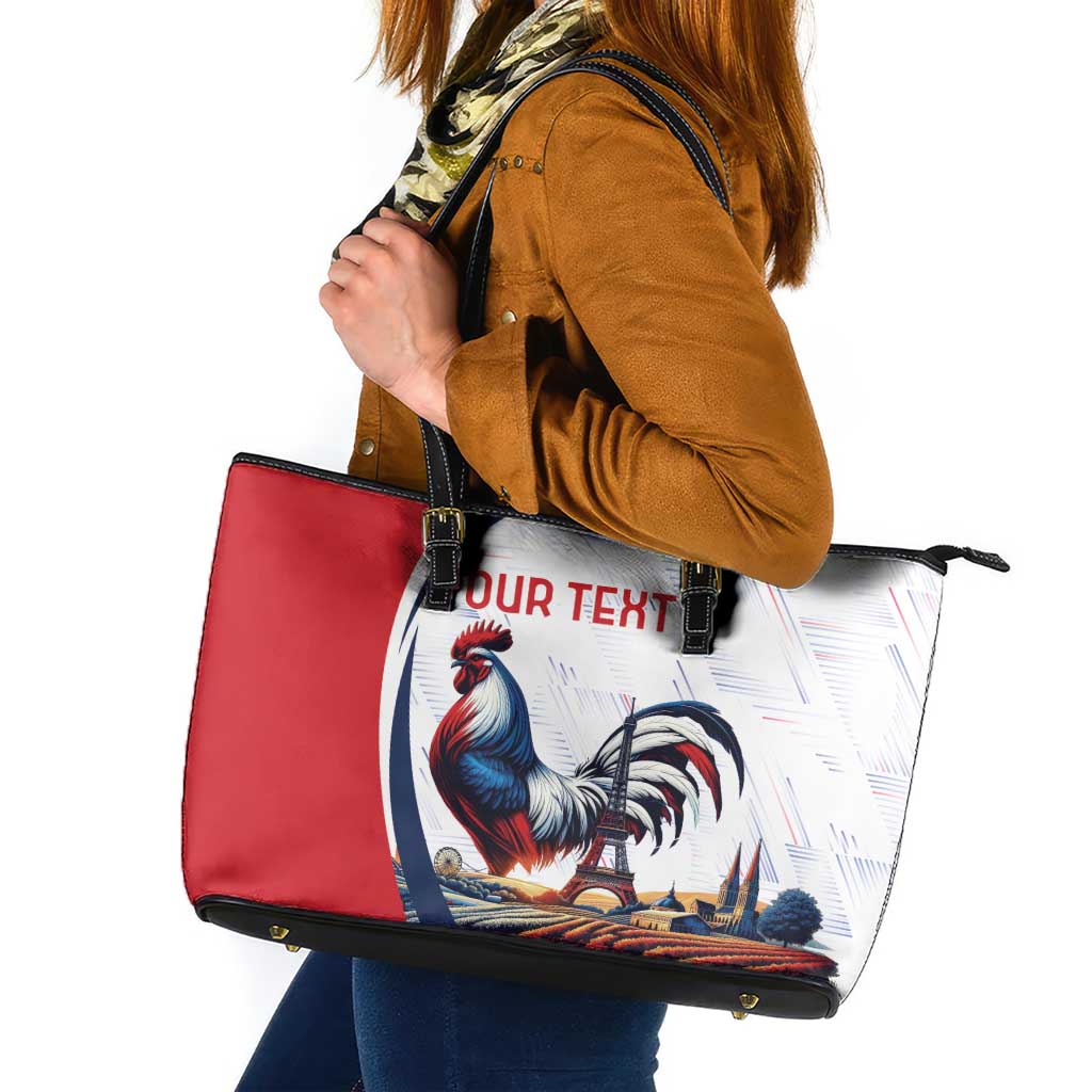 Red and white tote bag with rooster and Eiffel tower print, black handles, zip top.