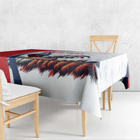France-themed rooster and Eiffel Tower tablecloth with red and blue accents, on wooden bench