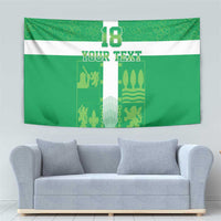 Green tapestry wall hanging with crest, white cross stripe, 'YOUR TEXT', and 18