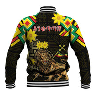 Black baseball jacket back with folk pattern, lion artwork, striped ribbed collar