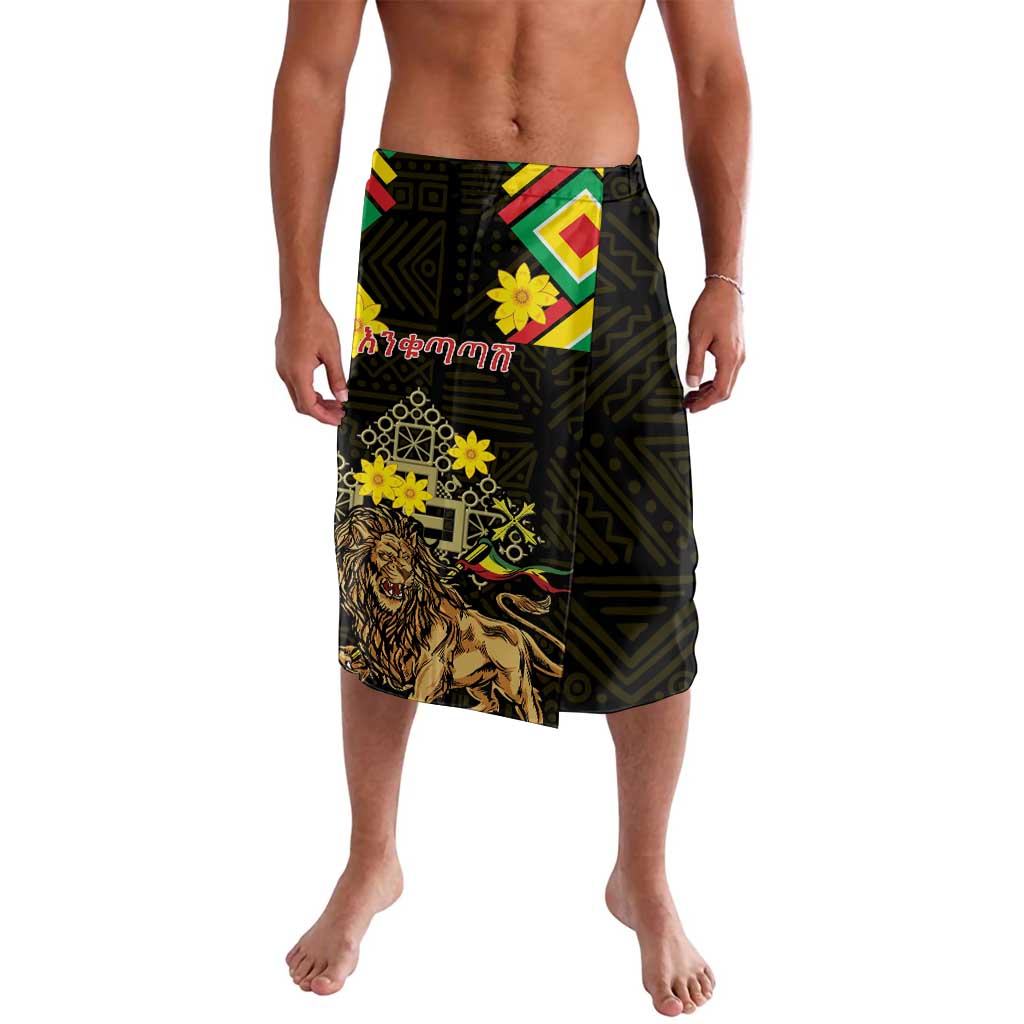 Black patterned lavalava/sarong with Lion of Judah graphic and folk motifs, wide wrap hem