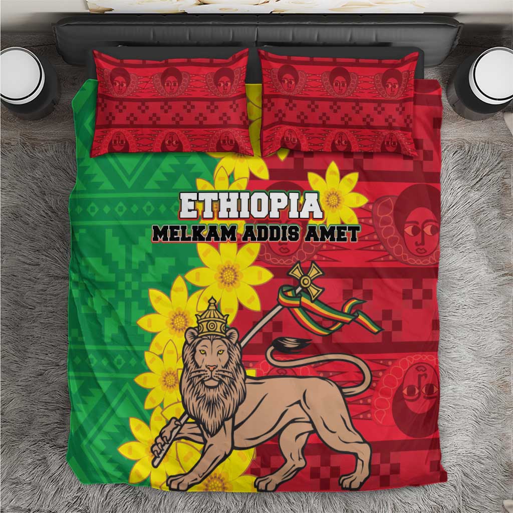 Top-down view of green and red bedding set featuring a lion illustration and yellow flower accents.