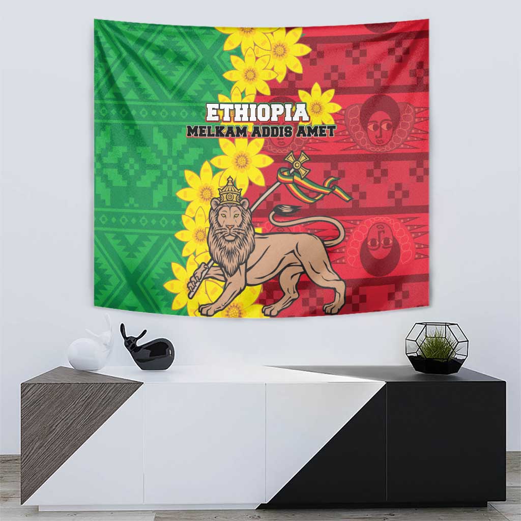 Green and red Ethiopian-style tapestry with lion, yellow blossoms, and emblem graphics