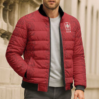 Red puffer bomber jacket with chest crest patch, black ribbed hem and cuffs, full zip