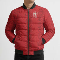 Red puffer bomber jacket with full-zip front, black ribbed cuffs, subtle repeating Viking pattern