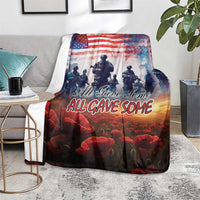 Veterans Day throw blanket with soldier silhouettes, poppies, and stars-and-stripes
