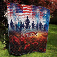 Patriotic quilt outdoors with US flag, soldier silhouettes, red poppy blooms, and slogan