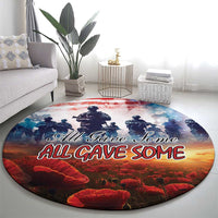 Round Veterans Day round rug featuring soldier silhouettes, poppy field colors, and “All Gave Some”