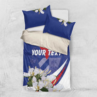 Blue and white bedding set with matching pillowcases, red star, and 'YOUR TEXT'