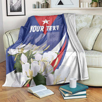 Personalized blue blanket with white star, floral print, and 'YOUR TEXT'.