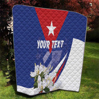 Personalized quilt blanket outdoors, blue red and white Cuban flag star, “YOUR TEXT” and flowers