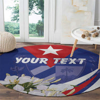 Personalized round rug with blue Cuban flag, red star, floral edge, and your text banner