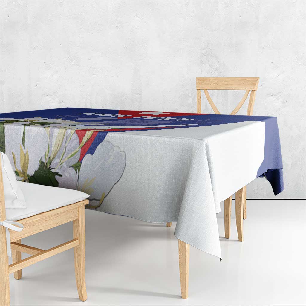 Blue and white tablecloth with printed floral border and corner drape
