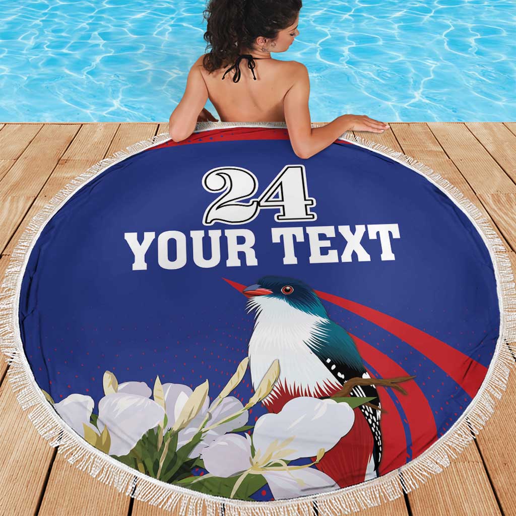 Blue round beach blanket with white fringe, bird graphic, and '24 YOUR TEXT' print