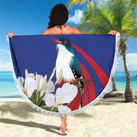 Blue round beach blanket with white fringe, bird and flowers, '24 YOUR TEXT' centered