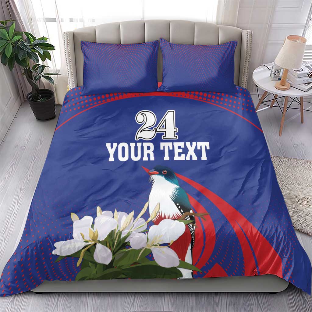 Blue bedding set with duvet and two pillowcases showing bird, white flowers, “24 YOUR TEXT”