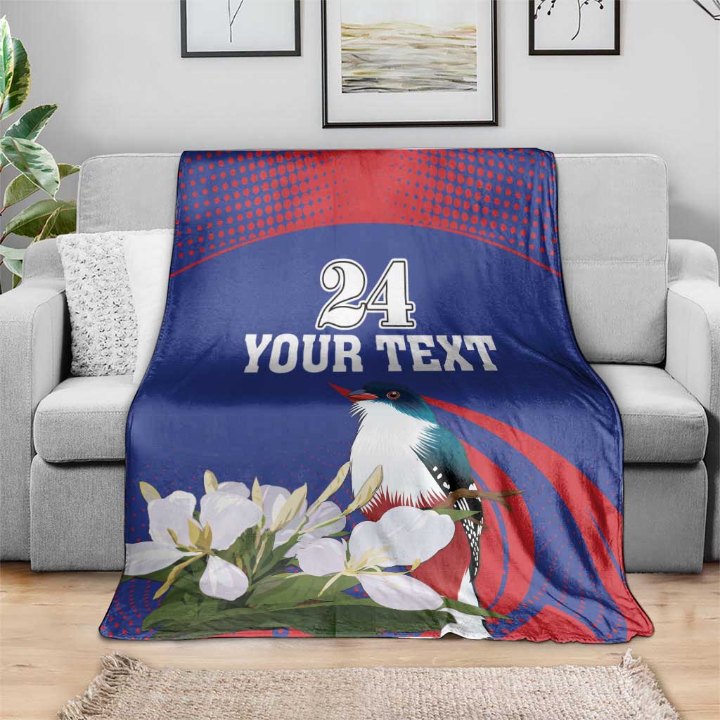 Custom blanket on sofa, blue and red with bird, white blossoms, and YOUR TEXT 24