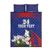 Blue quilt bed set with two pillows, centered 24 YOUR TEXT, bird and white flowers