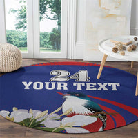 Round blue circular rug with "24 YOUR TEXT" toucan art, red swirl stripe, and white flowers