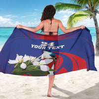 Blue sarong wrap with red arc border, bird and white flowers, '24 YOUR TEXT' (back)