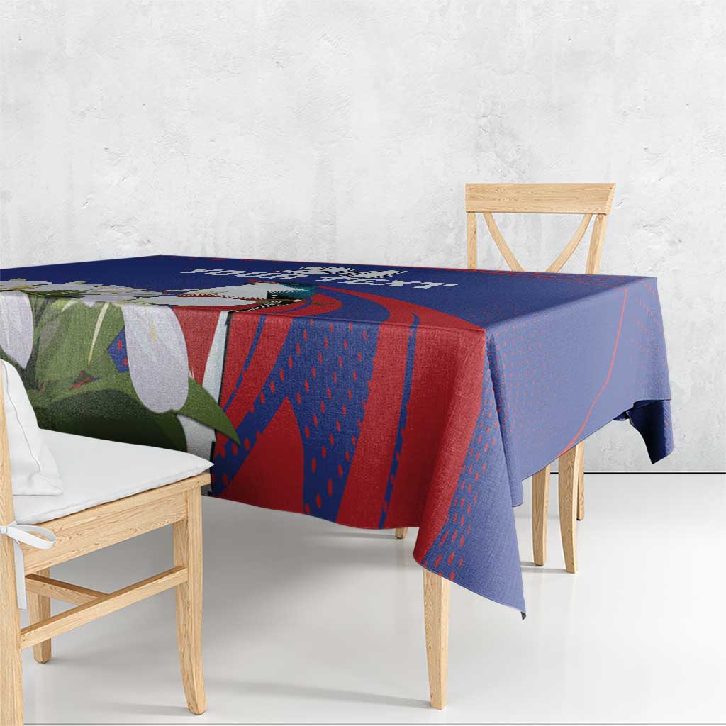 Blue tablecloth draped on rectangular table, red geometric stripes with white bird and flowers