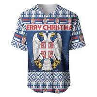 Blue Christmas baseball jersey with Serbia crest, wings, and 'MERRY CHRISTMAS' text.