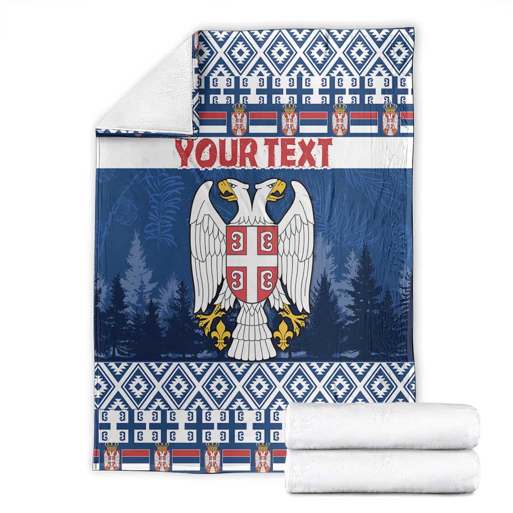 Blue Christmas blanket with eagle coat of arms, "YOUR TEXT", paired with rolled white linens