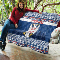 Blue quilt blanket with eagle crest, 'YOUR TEXT' stripe, and patterned trim border