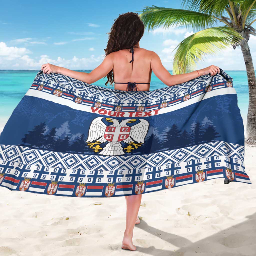 Blue wrap sarong with crest and geometric border on back, 'YOUR TEXT' strip