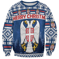 Blue crewneck sweatshirt with coat-of-arms and 'MERRY CHRISTM' front graphic